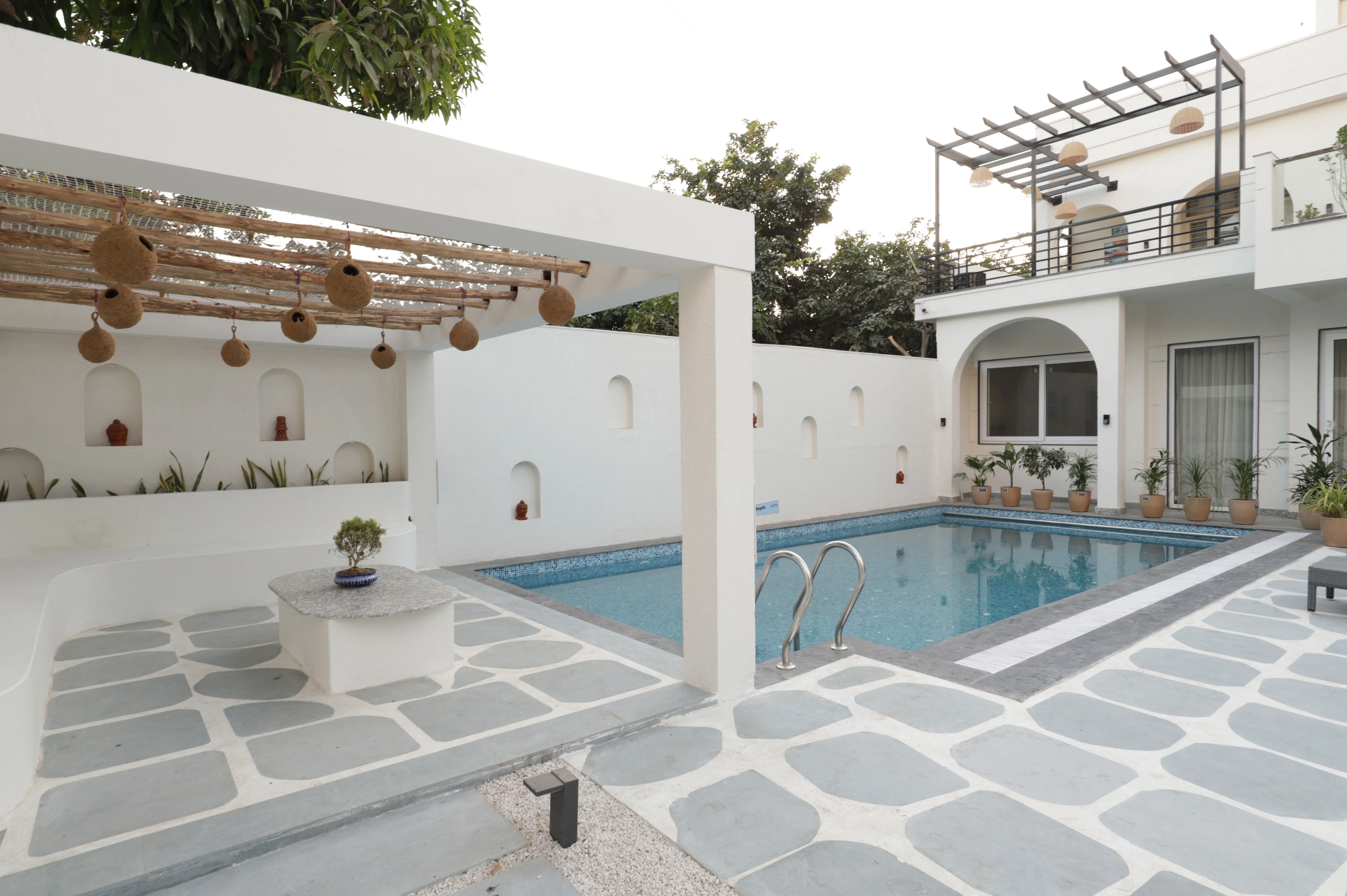 Brightly lit villa interior during the day