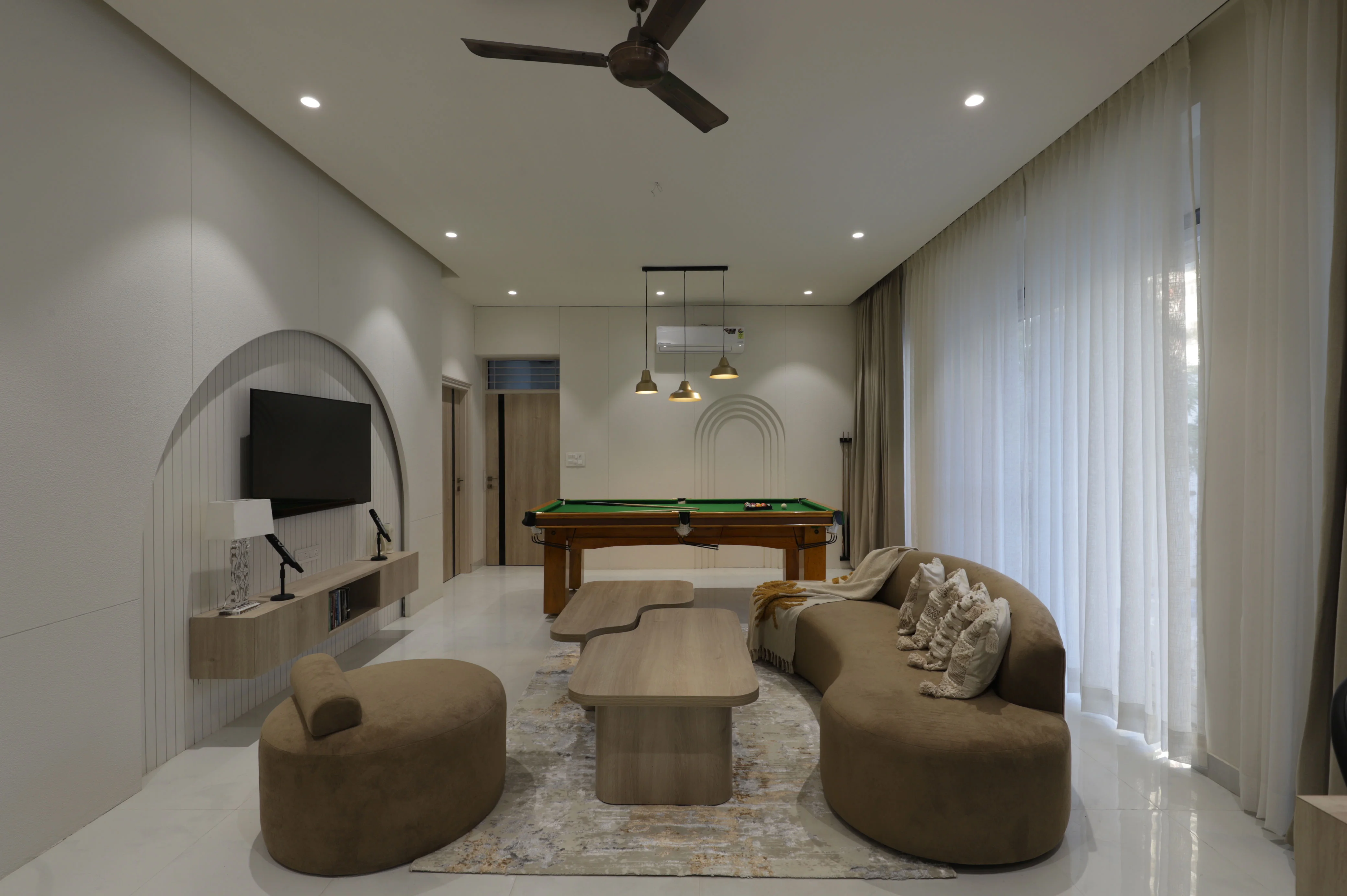 Nighttime shot of the villa's swimming pool with lights